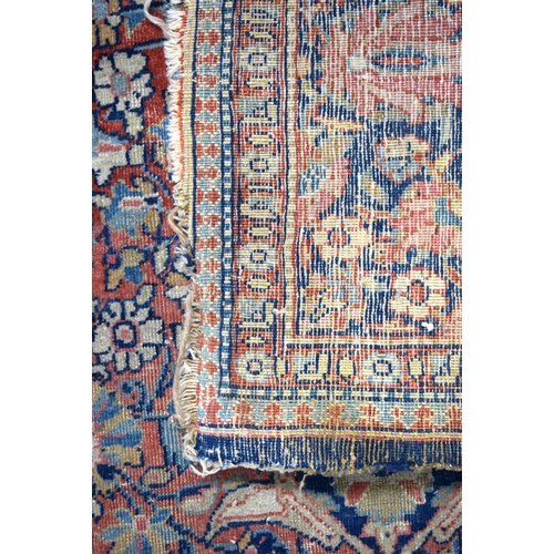 3802 - An Oriental rug 199 x 125 cm.