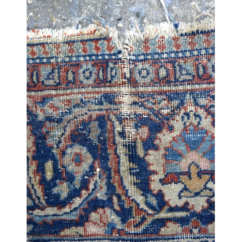 3802 - An Oriental rug 199 x 125 cm.