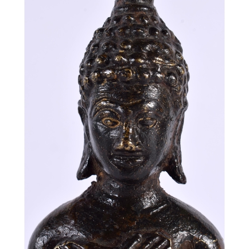 135 - AN 18TH/19TH CENTURY THAI CAMBODIAN SOUTH EAST ASIAN BRONZE BUDDHA modelled wearing a long robe with... 