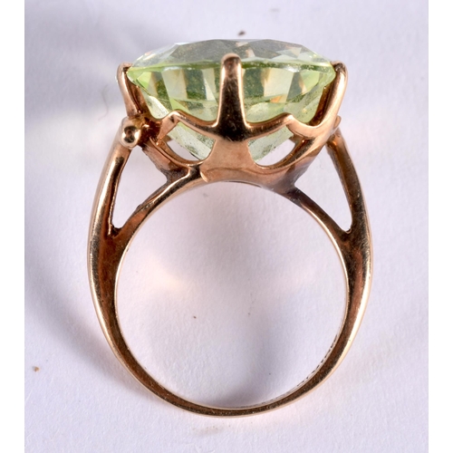 143 - A 10K GOLD GEM SET RING. 6.1 grams. J.