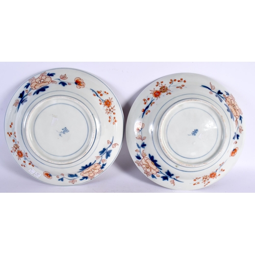 146 - A LARGE PAIR OF 18TH CENTURY JAPANESE EDO PERIOD IMARI PORCELAIN BOWLS painted with urns of flowers,... 