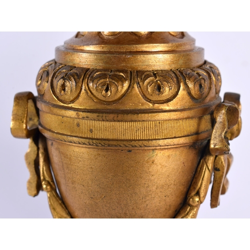 187 - A PAIR OF EARLY 19TH CENTURY FRENCH GILT BRONZE AND MARBLE CASSOLETTES modelled as reversible urns, ... 