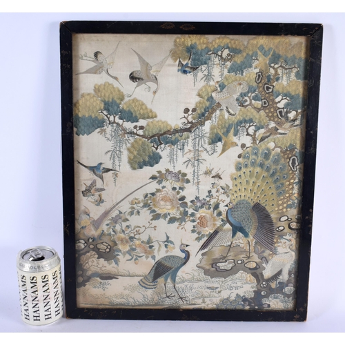 2 - A 19TH CENTURY CHINESE SILK EMBROIDERED PANEL Qing, depicting assorted birds of paradise amongst ext... 