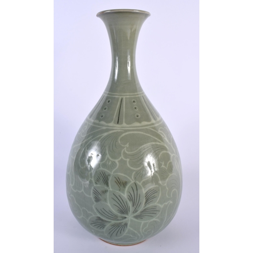 201 - A KOREAN CELADON PORCELAIN VASE painted with flowers and vines. 30 cm high.