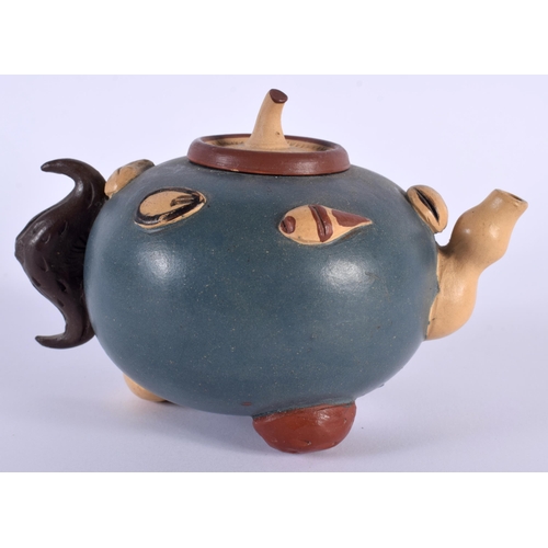 204 - AN EARLY 20TH CENTURY CHINESE YIXING POTTERY TEAPOT AND COVER overlaid with motifs. 13 cm wide.