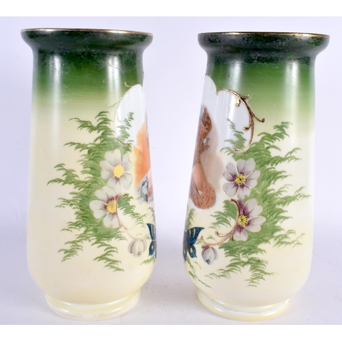 21 - A LARGE PAIR OF EARLY 20TH CENTURY CONTINENTAL GLASS VASES decorated with portraits of females, flan... 