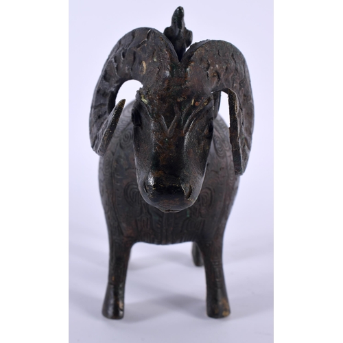 213 - A CHINESE REPUBLICAN PERIOD BRONZE FIGURE OF A STYLISED RAM modelled in the archaic manner. 18 cm x ... 