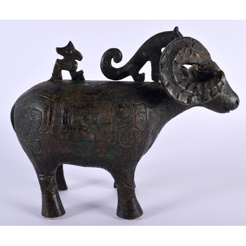 213 - A CHINESE REPUBLICAN PERIOD BRONZE FIGURE OF A STYLISED RAM modelled in the archaic manner. 18 cm x ... 