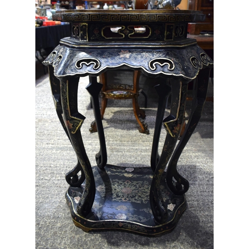 23 - A 19TH CENTURY CHINESE BLACK LACQUERED SCALLOPED TABLE Qing, painted with landscapes. 95 cm x 58 cm.