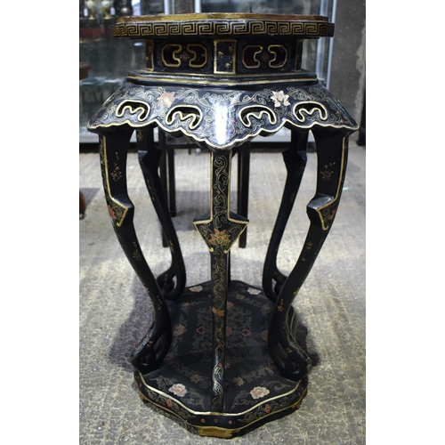 23 - A 19TH CENTURY CHINESE BLACK LACQUERED SCALLOPED TABLE Qing, painted with landscapes. 95 cm x 58 cm.