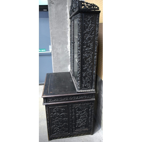 25D - AN UNUSUAL 19TH CENTURY CHINESE CARVED HARDWOOD DISPLAY CASE ON DESK exceptionally carved with drago... 