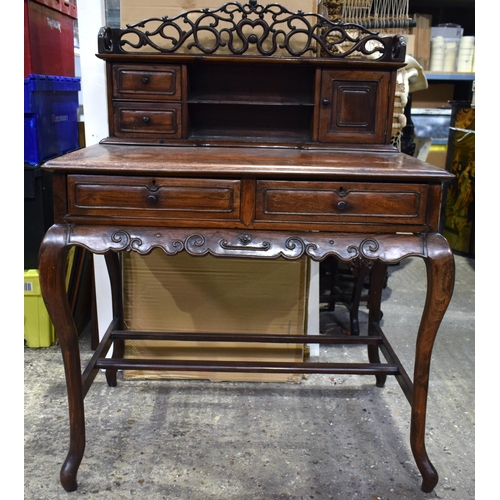 25H - A 19th Century Chinese hardwood two drawer desk with top shelf section and carved frieze gallery 121... 