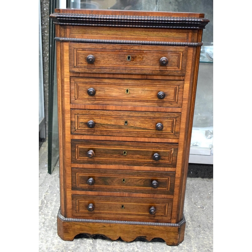 25K - AN EARLY VICTORIAN ROSEWOOD MINIATURE COLLECTORS APPRENTICE WELLINGTON TYPE CHEST with six drawers a... 