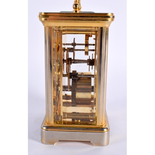 30 - A GARRARD CARRIAGE CLOCK. 15 cm high inc handle.