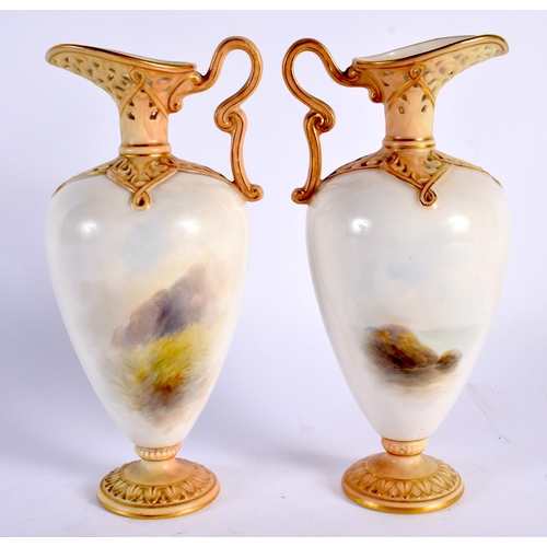 35 - A VERY FINE PAIR OF ROYAL WORCESTER RETICULATED PORCELAIN EWERS C1903 painted with cattle in landsca... 