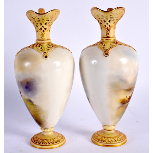 35 - A VERY FINE PAIR OF ROYAL WORCESTER RETICULATED PORCELAIN EWERS C1903 painted with cattle in landsca... 