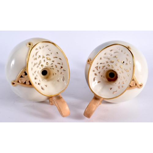 35 - A VERY FINE PAIR OF ROYAL WORCESTER RETICULATED PORCELAIN EWERS C1903 painted with cattle in landsca... 