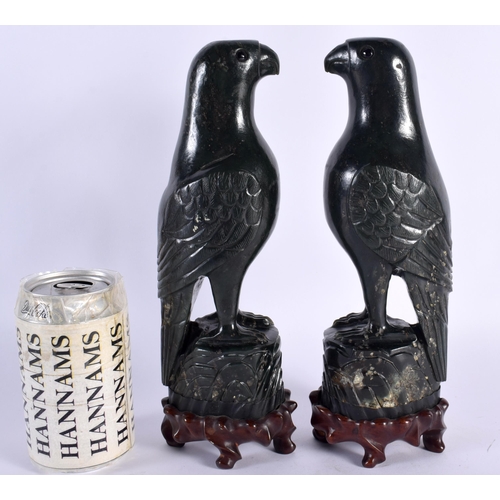 40 - A PAIR OF 19TH CENTURY CHINESE CARVED GREEN JADE FIGURES OF PARROTS Qing, each boldly modelled upon ... 