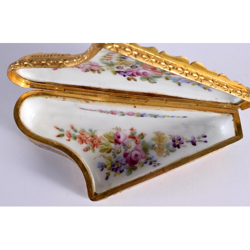 46 - A LATE 19TH CENTURY FRENCH PORCELAIN SNUFF BOX unusually in the form of a harp, painted with lovers ... 