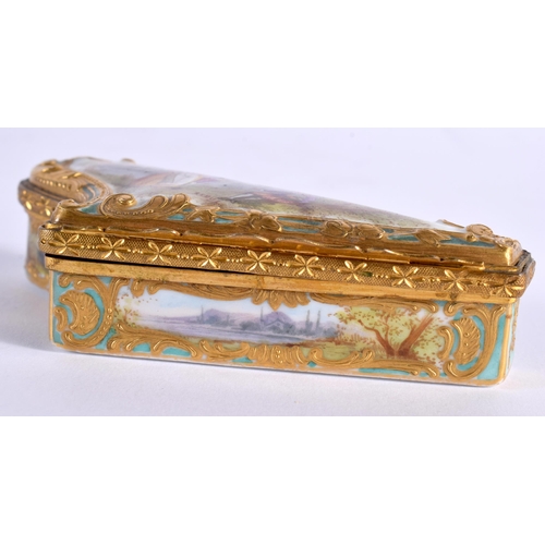 46 - A LATE 19TH CENTURY FRENCH PORCELAIN SNUFF BOX unusually in the form of a harp, painted with lovers ... 