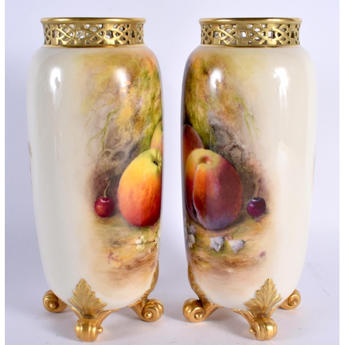 54 - A FINE PAIR OF ROYAL WORCESTER RETICULATED FRUIT PAINTED VASES by Ricketts, painted with apples and ... 