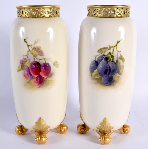 54 - A FINE PAIR OF ROYAL WORCESTER RETICULATED FRUIT PAINTED VASES by Ricketts, painted with apples and ... 