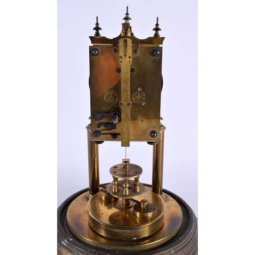 8 - A BRASS ANNIVERSARY CLOCK with glass dome. 28 cm x 14 cm. Note: A torsion pendulum clock, more commo... 