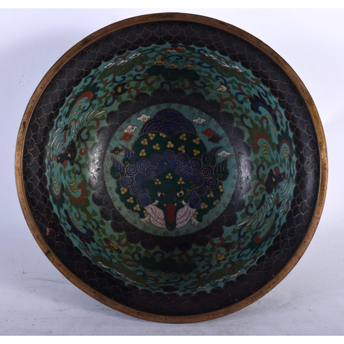 106 - A CHINESE QING DYNASTY CLOISONNE ENAMEL BOWL Ming style, the interior decorative with a beast, the o... 
