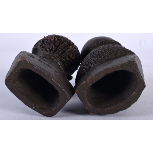 109 - A PAIR OF AFRICAN OJUANG POTTERY BUSTS OF TRIBAL PEOPLE. 10 cm x 4.5 cm.