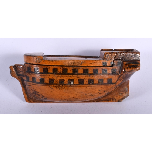 121 - A SMALL EARLY 19TH CENTURY PRISONER OF WAR CARVED WOOD BOAT the top decorative with a naive castle. ... 