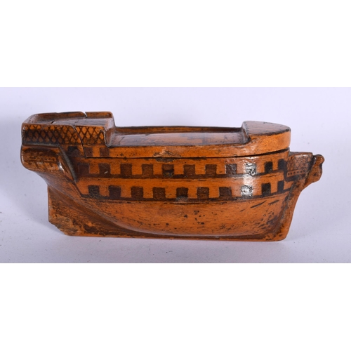 121 - A SMALL EARLY 19TH CENTURY PRISONER OF WAR CARVED WOOD BOAT the top decorative with a naive castle. ... 