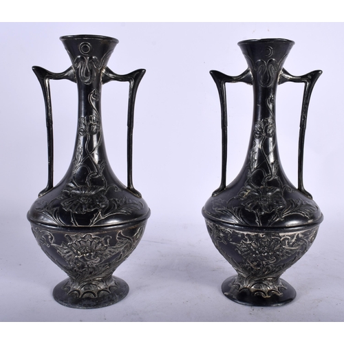 123 - A PAIR OF ART NOUVEAU TWIN HANDLED PEWTER VASES in the Manner of WMF. 21 cm x 8 cm.