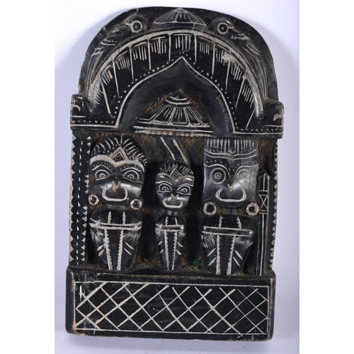 126 - AN UNUSUAL EARLY SOUTH AMERICAN CARVED BLACK STONE FIGURAL PLAQUE formed with three stylised figures... 