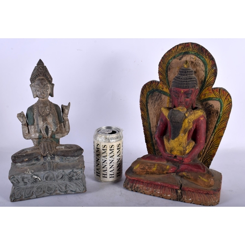 128 - TWO 19TH CENTURY INDIAN PAINTED WOOD BUDDHAS one modelled with hands raised, the other an erotic sta... 