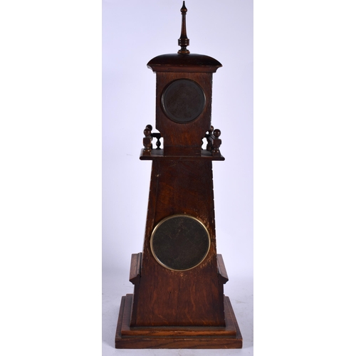 129 - A LARGE AND UNUSUAL LATE VICTORIAN CARVED OAK LIGHTHOUSE FORM CLOCK with aneroid barometer inset in ... 