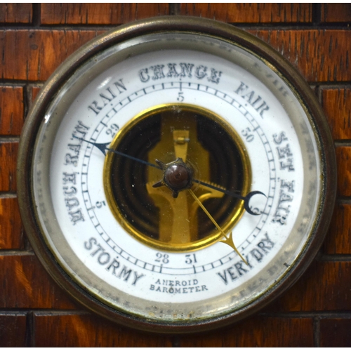 129 - A LARGE AND UNUSUAL LATE VICTORIAN CARVED OAK LIGHTHOUSE FORM CLOCK with aneroid barometer inset in ... 