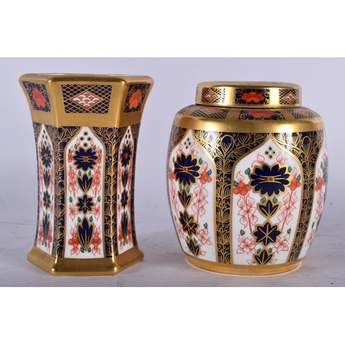 136 - A ROYAL CROWN DERBY IMARI 1128 TEA CADDY AND COVER together with a similar vase. 11cm high. (2)