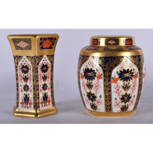 136 - A ROYAL CROWN DERBY IMARI 1128 TEA CADDY AND COVER together with a similar vase. 11cm high. (2)