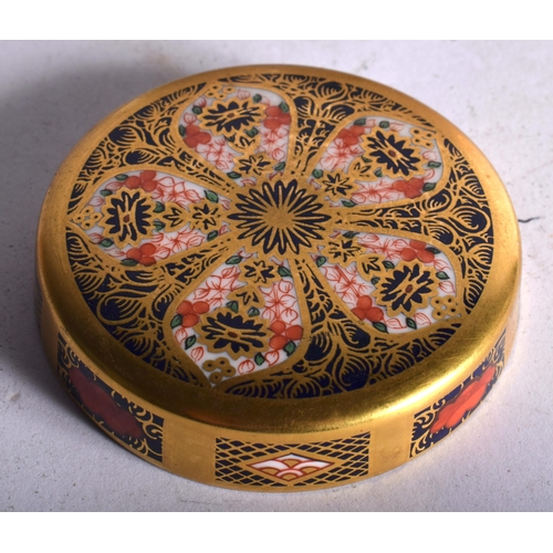 136 - A ROYAL CROWN DERBY IMARI 1128 TEA CADDY AND COVER together with a similar vase. 11cm high. (2)