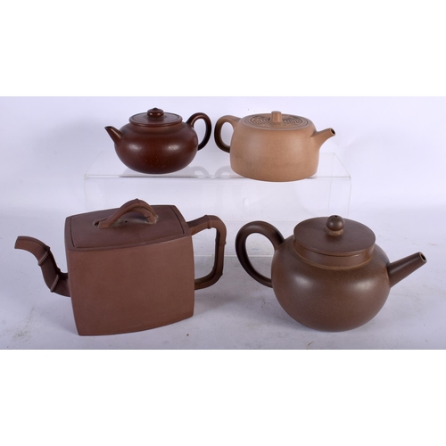 139 - FOUR CHINESE YIXING POTTERY TEAPOTS AND COVERS 20th Century. Largest 15.5 cm wide. (4)