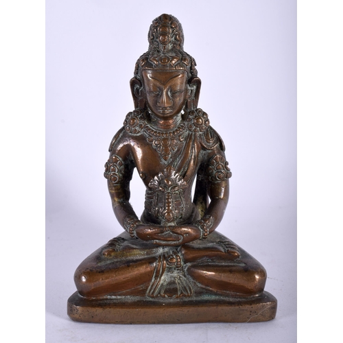 140 - A GOOD 18TH CENTURY TIBETAN NEPALESE BRONZE FIGURE OF A SEATED BUDDHA modelled holding a stupa, upon... 
