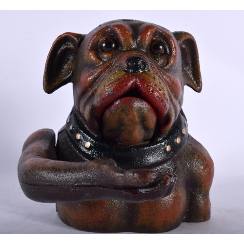 142 - AN UNUSUAL NOVELTY PAINTED CAST IRON DOG MONEY BOX. 18 cm x 12 cm.