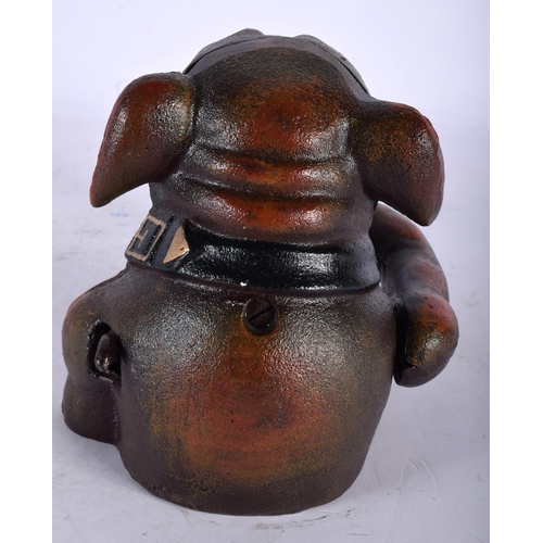 142 - AN UNUSUAL NOVELTY PAINTED CAST IRON DOG MONEY BOX. 18 cm x 12 cm.