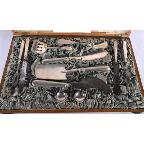 146 - A CASED SET OF 19TH CENTURY RUSSIAN SILVER CUTLERY possibly for caviar, bearing monogram to handles.... 