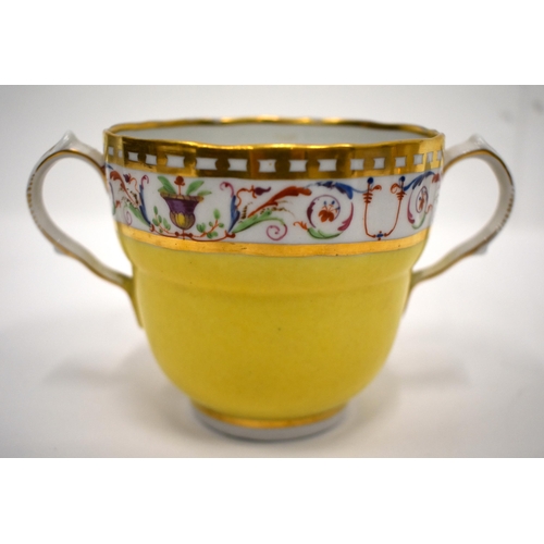 166 - Early 19th century Coalport rare yellow ground chocolate or caudle cup and stand painted with a bord... 