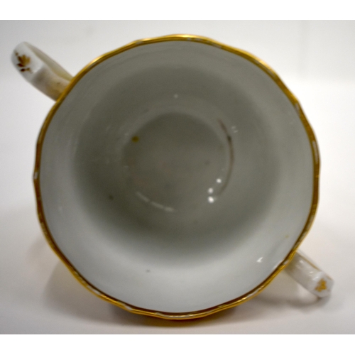 166 - Early 19th century Coalport rare yellow ground chocolate or caudle cup and stand painted with a bord... 