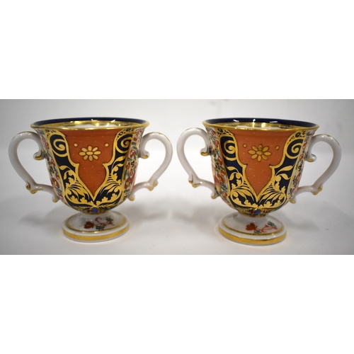 168 - 19th century Derby pair of two handled cups and saucer in an imari pattern, red mark.(4) cup 7.5cm h... 