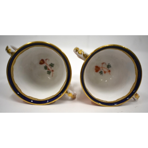 168 - 19th century Derby pair of two handled cups and saucer in an imari pattern, red mark.(4) cup 7.5cm h... 