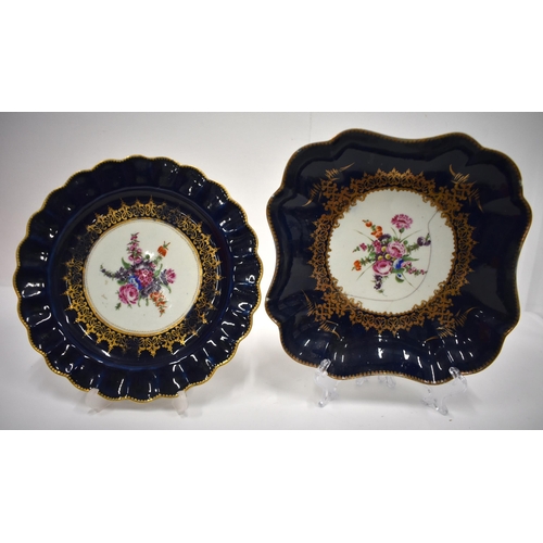 176 - 18th century Worcester wet blue wares: a pair plates painted with Chinese style flowers, Two plates ... 