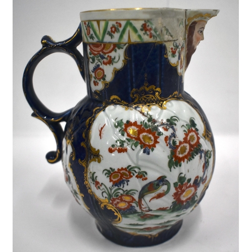 183 - 18th century Worcester mask jug painted in kakiemon style with two panels one with flowers, the othe... 